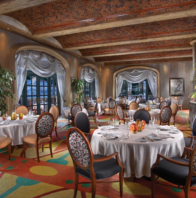 Picasso in Las Vegas — Bellagio's Mediterranean fine-dining room under original Pablo Picasso canvases — two Michelin stars and a fountains-facing patio
