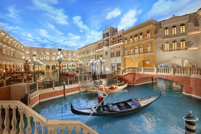 Grand Canal Shoppes at The Venetian in Las Vegas — A half-mile indoor Venetian streetscape with a real canal, singing gondoliers, and 160 stores under a painted sky